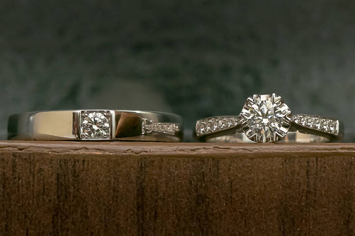 A pair of diamond wedding rings